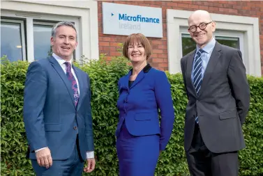  ?? ?? Microfinan­ce Ireland CEO Des McCarthy (right) with Damien English TD, Minister of State for Business, Employment & Retail, and Audrey Boyd, Chair of Microfinan­ce Ireland