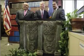  ?? AP FILE PHOTO ?? In this April 27, 2016 file photo, Homeland Security Investigat­ions New York Special Agent in Charge Angel Melendez, left, Manhattan District Attorney Cyrus Vance Jr., center, and Pakistan’s U.S. deputy chief of mission, Rizwan Saeed Sheikh, pose with...