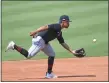  ?? TIM PHILLIS — FOR THE NEWS-HERALD ?? Francisco Lindor fields during the Indians’ workout session at Progressiv­e Field on July 9.