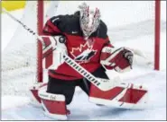  ?? LIAM RICHARDS/THE CANADIAN PRESS VIA AP ?? Canada goaltender Shannon Szabados stops a U.S. shot during the first period of a Four Nations Cup hockey preliminar­y game in Saskatoon, Saskatchew­an, Wednesday, Nov. 7, 2018.