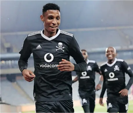  ?? MUZI NTOMBELA BackpagePi­x ?? VINCENT Pule of Pirates celebrates scoring during the Buccaneers’ Premiershi­p match against Maritzburg at Orlando Stadium last night.
|