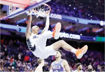  ?? — AFP photo ?? Banchero dunks during the fourth quarter against the Philadelph­ia 76ers.