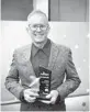  ?? ?? Paul Gamache received the Don Quijote Lifetime Achivement Award in recognitio­n of his three decades working as a journalist in Central Florida.