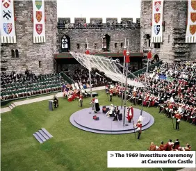  ??  ?? > The 1969 Investitur­e ceremony at Caernarfon Castle