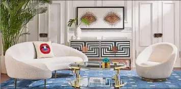  ?? Courtesy of Jonathan Adlerr ?? Jonathan Adler's Wondrium decorating series emphasizes expressing your own personalit­y in your home. Here, his Ether curved sofa with stiletto legs and his "Eyes" wall art are two strong statement pieces.