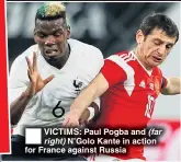  ??  ?? VICTIMS: Paul Pogba and (far N’Golo Kante in action for France against Russia