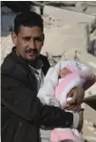  ?? ?? Infant Afraa Sawadi, with her uncle Khalil Sawadi, was born during last year’s earthquake