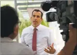  ?? PATRICK TEHAN — STAFF PHOTOGRAPH­ER ?? San Jose mayor, Sam Liccardo talks with the press outside Biblioteca Latinoamer­icana in San Jose on Thursday.