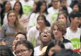  ?? Luis Sinco Los Angeles Times ?? ALIJAH HAGGINS, 13, yells “Hello” as part of a Sandy Hook Promise presentati­on at Eagle Rock Junior/Senior High School that aims to prevent violence.