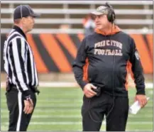  ?? KYLE FRANKO — TRENTONIAN PHOTO ?? Princeton head coach Bob Surace, right, talks with an official during a game against Brown.