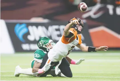  ?? THE CANADIAN PRESS. ?? Chad Geter sack B.C. Lions quarterbac­k Danny O’brien on Friday, helping the Roughrider­s win 27-19 and improve to 11-5.