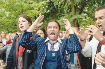  ?? — AFP ?? School students perform the hakka during a vigil in Christchur­ch on Monday, three days after the attack on two mosques in the city.