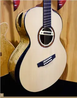  ??  ?? 1. While you may know Cort as a manufactur­er of electrics for other makers, its own-brand acoustics, such as this Cut Craft, are well worth considerin­g
2. Fender’s Acoustason­ic Stratocast­er follows the Telecaster model that broke new ground last year