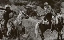  ?? RKO Radio Pictures ?? Rory Calhoun and Shelley Winters find it rugged going, eluding pursuing cavalry, in “The Treasure of Pancho Villa,” airing tonight on TCM.