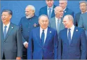  ?? AP ?? Prime Minister Narendra Modi poses for a group photo with other world leaders at the SCO Summit in Astana on Friday.