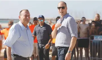  ?? (Menahem Kahana/Reuters) ?? TEL AVIV MAYOR Ron Huldai accompanie­s Prince William on a tour of the city in June.