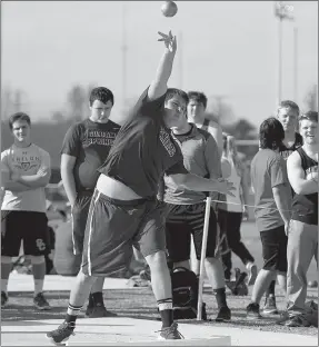  ?? Bud Sullins/Special to the Herald-Leader ?? Isaac Knudson spins in the circle last Thursday while throwing the shot at the Panther Relays held at Glenn W. Black Stadium.