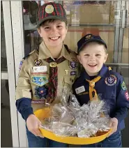  ?? SUBMITTED PHOTO ?? Birdsboro Pack 595 Cub Scouts Jacob Derer, 10, and Mark Derer Jr., 6, brothers from Birdsboro, have been making cookies weekly to help provide some cheer to the elderly in the community.