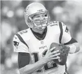  ?? RICH BARNES/AP ?? Patriots quarterbac­k Tom Brady had four touchdowns against Miami in the November matchup.