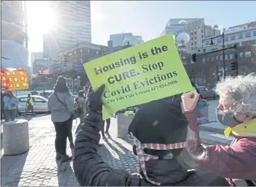  ?? MICHAEL DWYER — THE ASSOCIATED PRESS ARCHIVES ?? Tenants’ rights advocates demonstrat­e outside the Edward W. Brooke Courthouse in Boston. The Treasury Department has announced plans to reallocate rental assistance money in a bid to get more cash into the hands of families facing eviction.