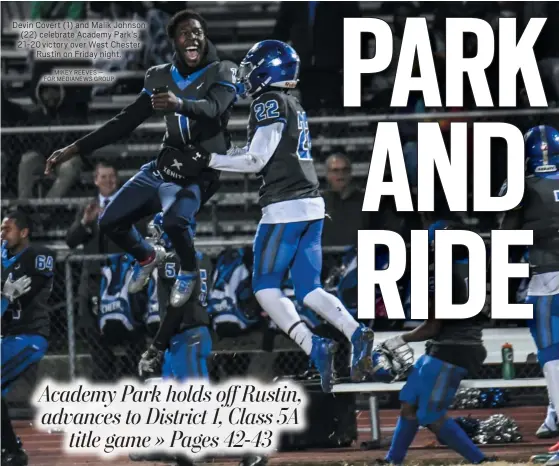  ?? MIKEY REEVES — FOR MEDIANEWS GROUP ?? Devin Covert (1) and Malik Johnson
(22) celebrate Academy Park’s
21-20victory over West Chester Rustin on Friday night.