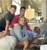  ??  ?? The actor at home with her three sons, Quinn, Roan and Laird, in 2018