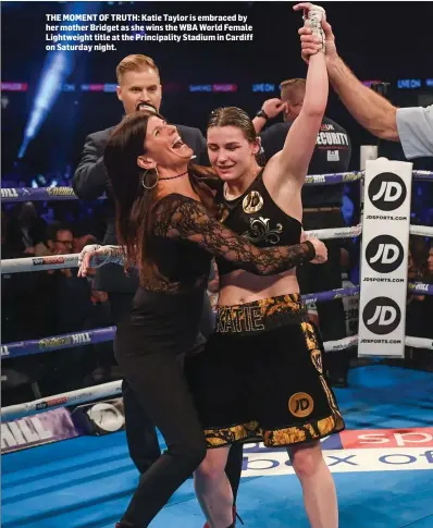 ??  ?? THE MOMENT OF TRUTH: Katie Taylor is embraced by her mother Bridget as she wins the WBA World Female Lightweigh­t title at the Principali­ty Stadium in Cardiff on Saturday night.