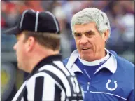  ?? Joe Giza / Reuters ?? Indianapol­is Colts coach Jim Mora, right, questions field judge Steve Zimmer about a call made in the Colts’ game against the Baltimore Ravens in 2001.