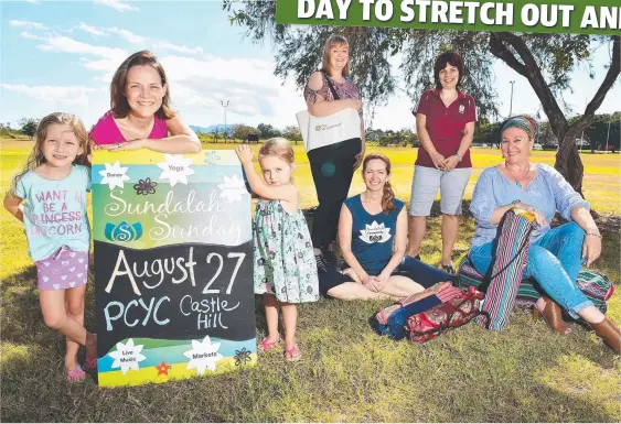  ?? IN POSITION: Yoga fans Marly, 5, Brooke and Paige Batchelor, 3, with Jan Leese, Jasmine Healy- Pagan, Pat Chebosy and Annette Scott. Picture: SHAE BEPLATE ??