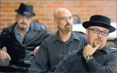  ?? ADOLPHE PIERRE-LOUIS/JOURNAL ?? From left, Walter Gaspar, Joe Griffenber­g and John Converse wait their turn to be judged in the Walter White look-alike contest on Tuesday. Forty men competed.