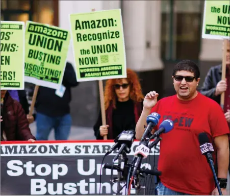  ?? EDUARDO MUNOZ ALVAREZ — THE ASSOCIATED PRESS FILE ?? Amazon Jfk8distri­bution center union organizer Jason Anthony speaks to media in the Brooklyn borough of New York in April 2022. The U.S. union membership rate reached an all-time low in 2022, despite high-profile unionizati­on campaigns at Starbucks, Amazon and other companies. Union members fell to 10.1% of the overall workforce, according to the U.S. Bureau of Labor Statistics. That was down slightly from 10.3% in 2021.