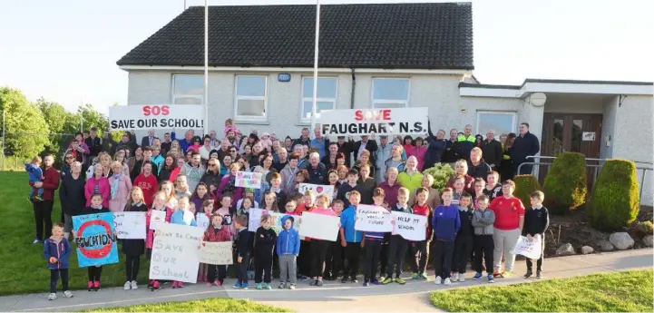  ??  ?? A large group of parents and pupils at the Save Our School campaign at Scoil Naisiunta Bhrighde in Faughart.