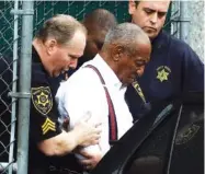  ?? AP PHOTO/MATT SLOCUM ?? Bill Cosby is led away after his sentencing hearing Tuesday at the Montgomery County Courthouse in Norristown, Pa. Cosby left in handcuffs to begin serving a three-to10-year prison sentence for sexual assault.