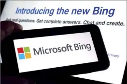  ?? AP file photo ?? The Microsoft Bing logo and the website’s page are shown in this photo taken in New York on Feb. 7. Microsoft is promising to make improvemen­ts to its new artificial­ly intelligen­t Bing search engine after it’s been insulting and threatenin­g some of its early users.