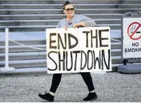  ?? LARRY WONG/POSTMEDIA NEWS ?? More than 200 people rallied in front of the Alberta Legislatur­e on Wednesday to protest the Alberta government restrictio­ns during the COVID-19 pandemic.