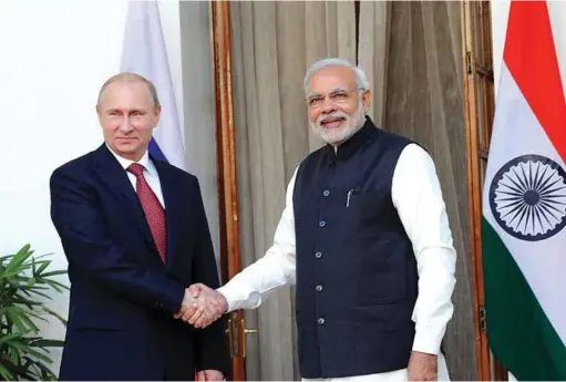  ??  ?? Prime Minister Narendra Modi with the President of the Russian Federation, Vladimir Putin, in New Delhi on December 11, 2014