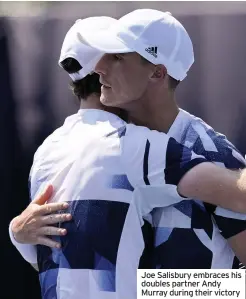  ??  ?? Joe Salisbury embraces his doubles partner Andy Murray during their victory