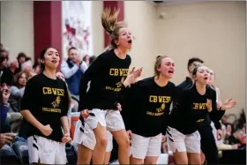  ?? JAMES BEAVER/FOR MEDIANEWS GROUP ?? The Central Bucks West bench erupts after Emily Spratt (13) is fouled after making her shot attempt in the closing minutes of the second round of state playoffs Tuesday night.