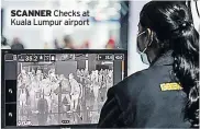  ??  ?? SCANNER Checks at Kuala Lumpur airport