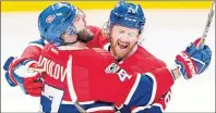  ?? RYAN REMIORZ/THE CANADIAN PRESS ?? Montreal Canadiens defenceman Jeff Petry, right, celebrates with right wing Alexander Radulov after scoring the first goal against the New York Rangers during Friday’s Game 2 of the Stanley Cup playoffs.