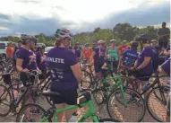  ?? / MILWAUKEE JOURNAL SENTINEL ?? About 50 members of Team Phoenix did a group training ride together to prepare for their triathlon.