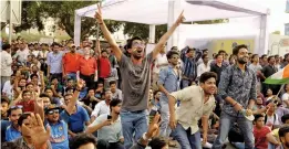  ?? — PRITAM BANDYOPADH­YAY ?? Fans celebrate as they watch a live telecast of the Champions Trophy final between India and Pakistan at Central Park on Sunday. Pakistan won by 180 runs.