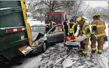  ?? FILE ?? Under the proposal in the Ohio House, a driver who fails to move over for a garbage truck with its lights flashing could be fined $300 plus court costs and sustain a moving violation charge. Garbage trucks make 600 to 900 stops per day.