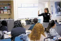  ?? LUIS SÁNCHEZ SATURNO/THE NEW MEXICAN ?? Female students at Capital High who work with Communitie­s In Schools can participat­e in a girls empowermen­t class that meets every week. The class allows them to interact with female profession­als who share their stories of childhood challenges and career success.