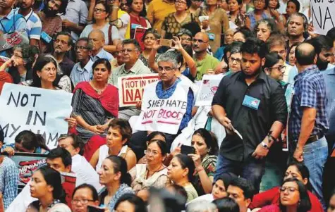  ?? Reuters ?? People protest against the recent cases of lynching of mainly Muslims in New Delhi yesterday. Celebritie­s and leading activists joined ordinary citizens in cities across India to protest the recent killings.