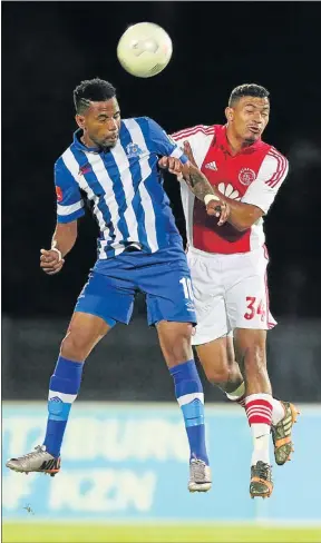  ?? Picture: GALLO IMAGES ?? FIGHTING FOR POSSESSION: Nhlanhla Vilakazi of Maritzburg United, left, competes for the ball with Toriq Losper of Ajax Cape Town during their Absa Premiershi­p match at the Harry Gwala Stadium in Pietermari­tzburg last night