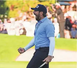  ?? GREGORY BULL/AP ?? Matthieu Pavon celebrates on the 18th green of the South Course at Torrey Pines after winning the Farmers Insurance Open on Saturday in San Diego.