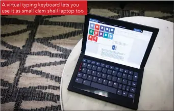  ??  ?? A virtual typing keyboard lets you use it as small clam shell laptop too