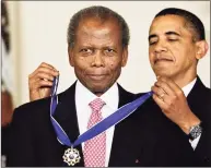  ?? J. Scott Applewhite / Associated Press file photo ?? President Barack Obama presents the 2009 Presidenti­al Medal of Freedom to Sidney Poitier during ceremonies at the White House in Washington on Aug. 12, 2009.