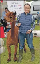  ?? 25_c33alpacas­01 ?? Zofija with one of her alpacas.